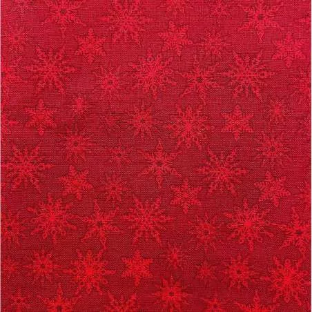 Tessuto natalizio rosso con fiocchi di neve tono su tono