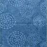 Tessuto Batik azzurro intenso con fiori e pois