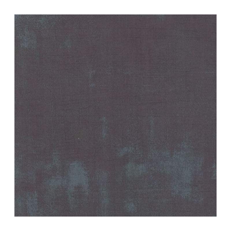 Moda, collezione Grunge, tessuto sfumato grigio piombo