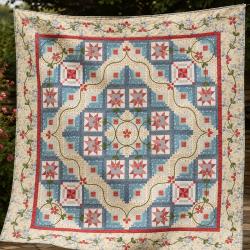 A Log Cabin in Bloom, Quilt Mystery 2026 Roberta De Marchi - Quilt finito con applicazioni